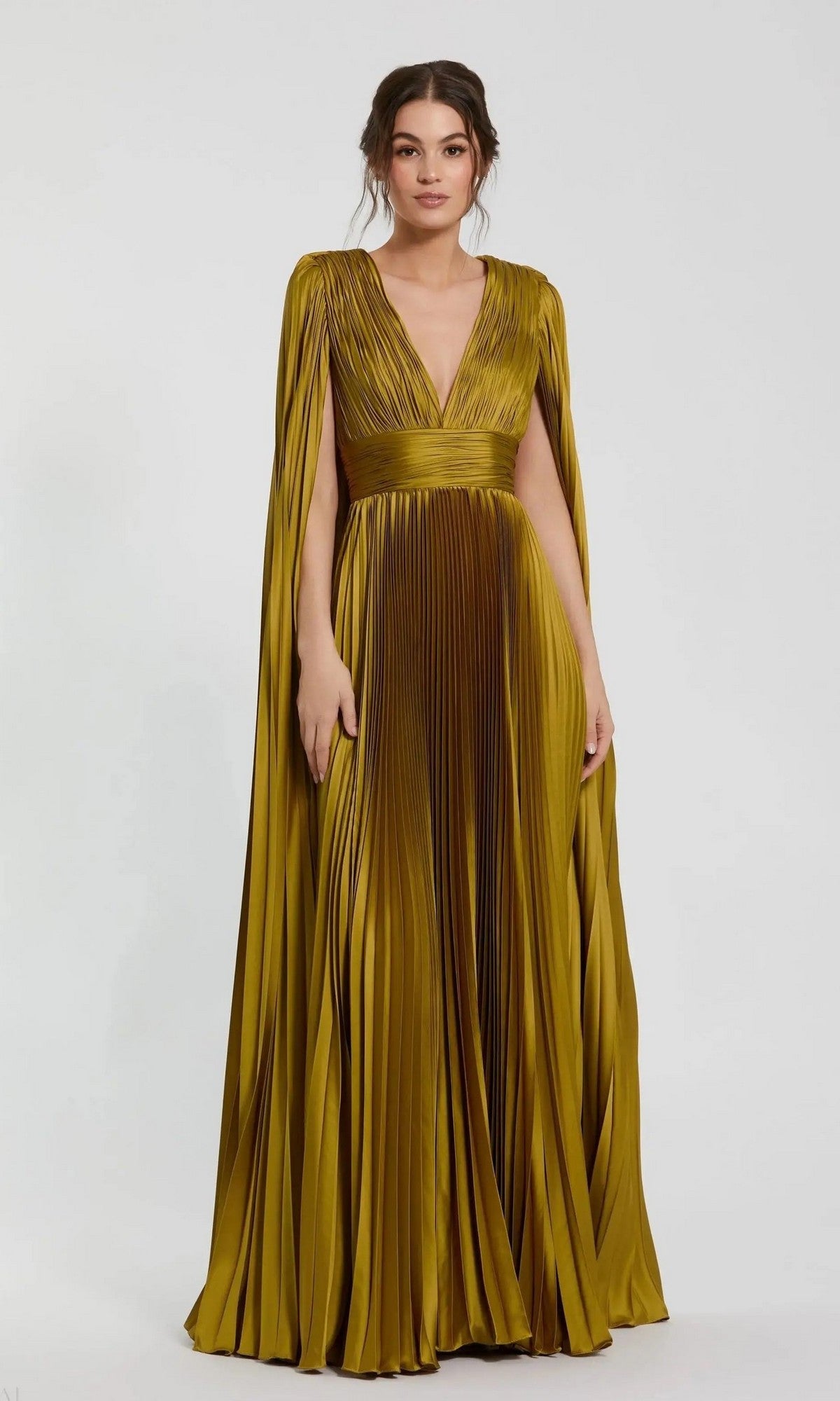 A woman wears the Mac Duggal 49872 long formal dress in chartreuse, featuring floor-length pleated charmeuse, cape-like sleeves, and a deep V-neckline against a plain light background.